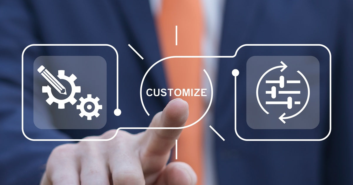 A person in a suit touches holographic symbols with the word "Customize" as they interact with a digital interface.