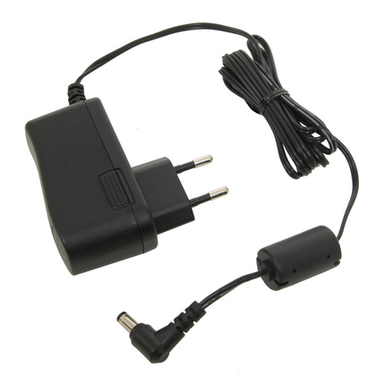 Close-up view of the European 2-pin wall plug configuration on the Icom BC123SE AC power supply adapter.