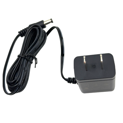 Side profile showing the output power plug of the Icom BC147SA trickle charger AC adapter.
