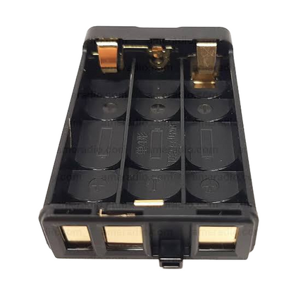 Close-up detail of the 3 x AAA battery compartment interior and rubber seal on the Icom BP297.