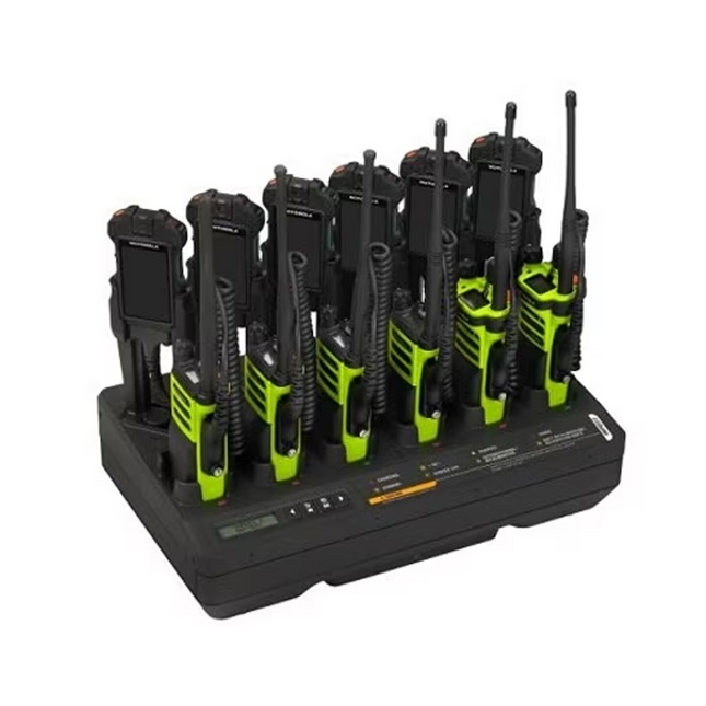 Motorola NNTN8897A IMPRES 2 Multi-Unit Charger showing the six-pocket layout and center diagnostic LCD screen.