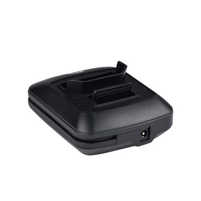 Rear profile of the Motorola PMLN6701A desktop charging base detailing the power supply input jack configuration.