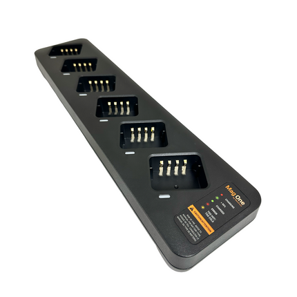Side angle view of the Motorola PMLN8893A multi-unit charging tray showing the clean cable-management slot layout.