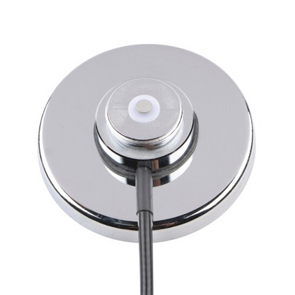Close-up detail of the chrome magnetic NMO base and coax cable on the Motorola RLN6097A.